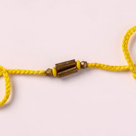 Tribal Odisha Dokra Brass & Threadwork Rakhi 09