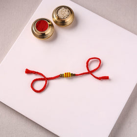 Tribal Odisha Dokra Brass & Threadwork Rakhi 10