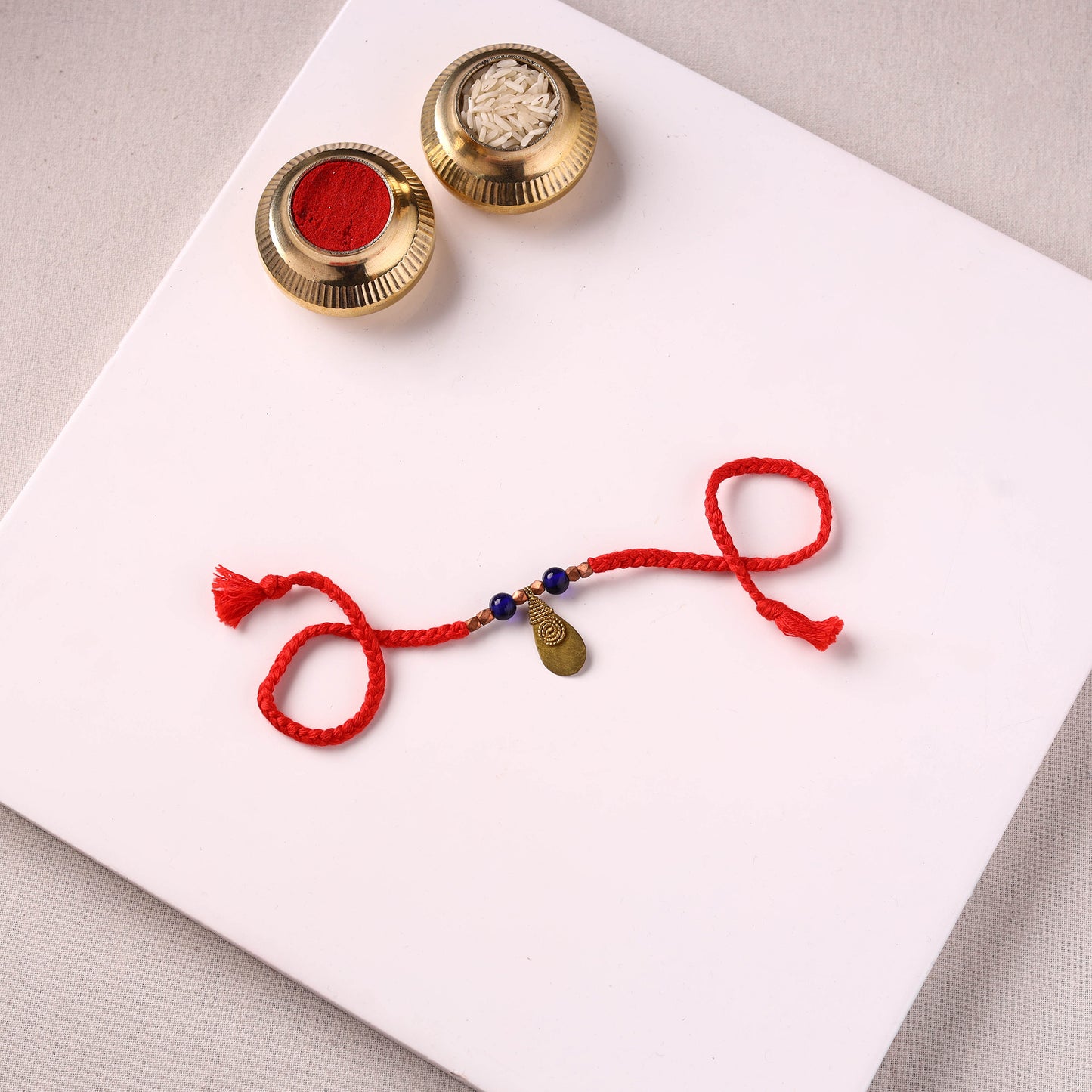 Tribal Dokra Craft Brass & Threadwork Rakhi 38