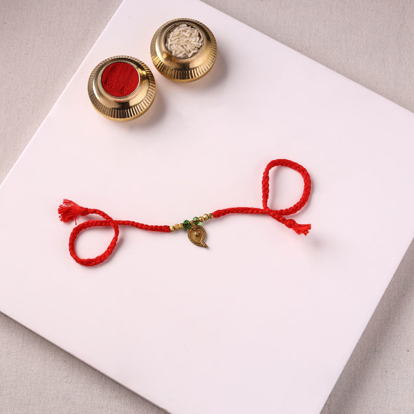 Tribal Dokra Craft Brass & Threadwork Rakhi 49