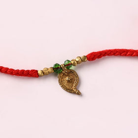 Tribal Dokra Craft Brass & Threadwork Rakhi 49