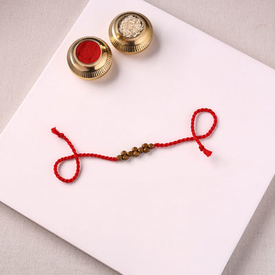 Tribal Dokra Craft Brass & Threadwork Rakhi 03