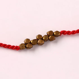 Tribal Dokra Craft Brass & Threadwork Rakhi 03