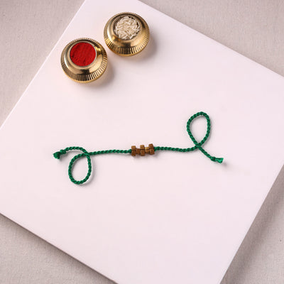 Tribal Dokra Craft Brass & Threadwork Rakhi 06