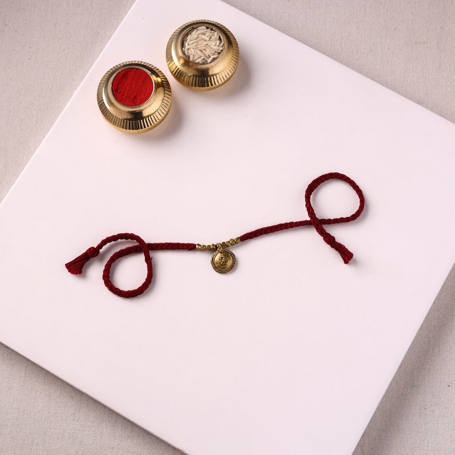 Tribal Dokra Craft Brass & Threadwork Rakhi 57