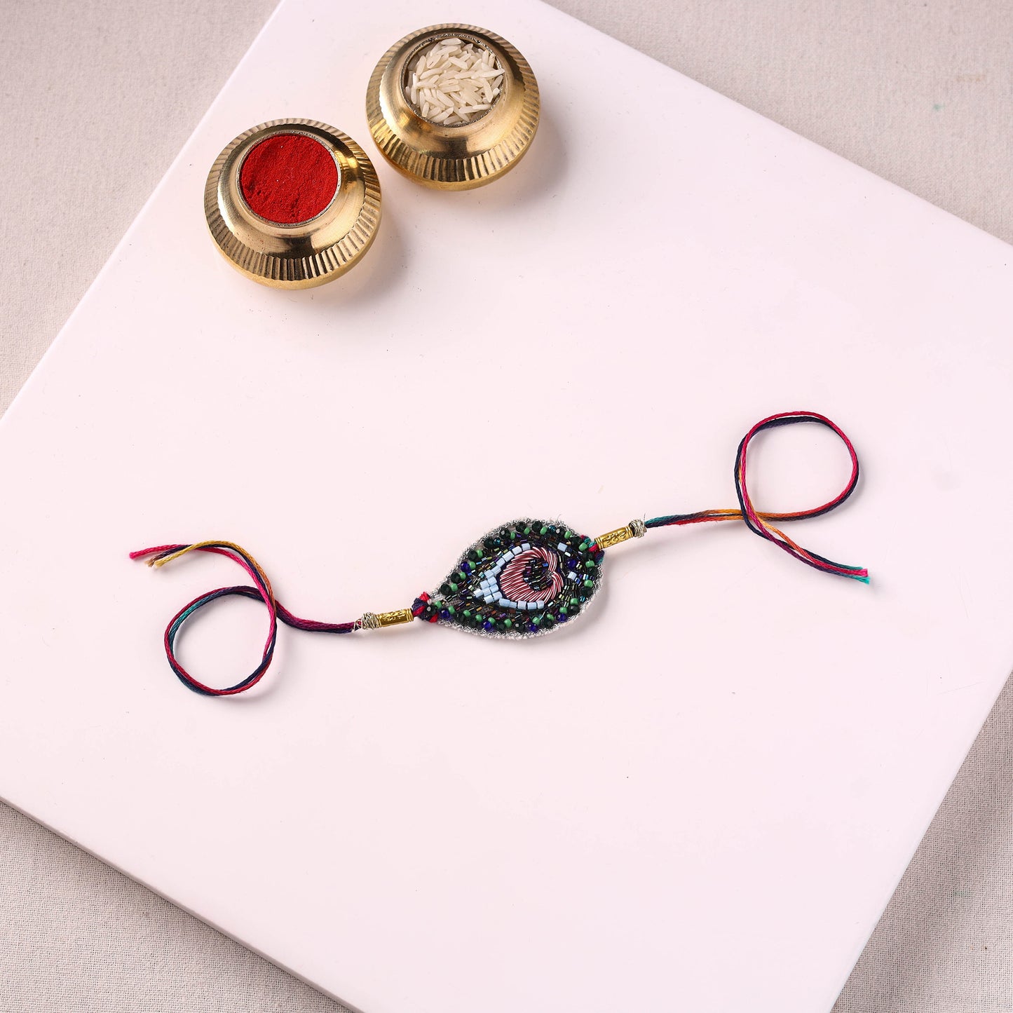 Peacock Feather - Handmade Beadwork Rakhi by Jugni 07