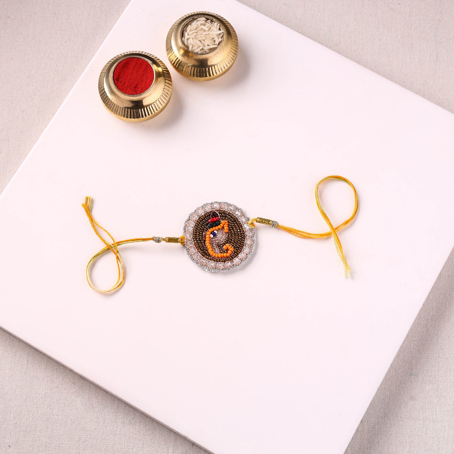 Round Ganesha - Handmade Beadwork Rakhi by Jugni 20