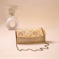 Beige - Hand Embroidered Jute Lucknowi Chikankari Clutch with Zari Work 13