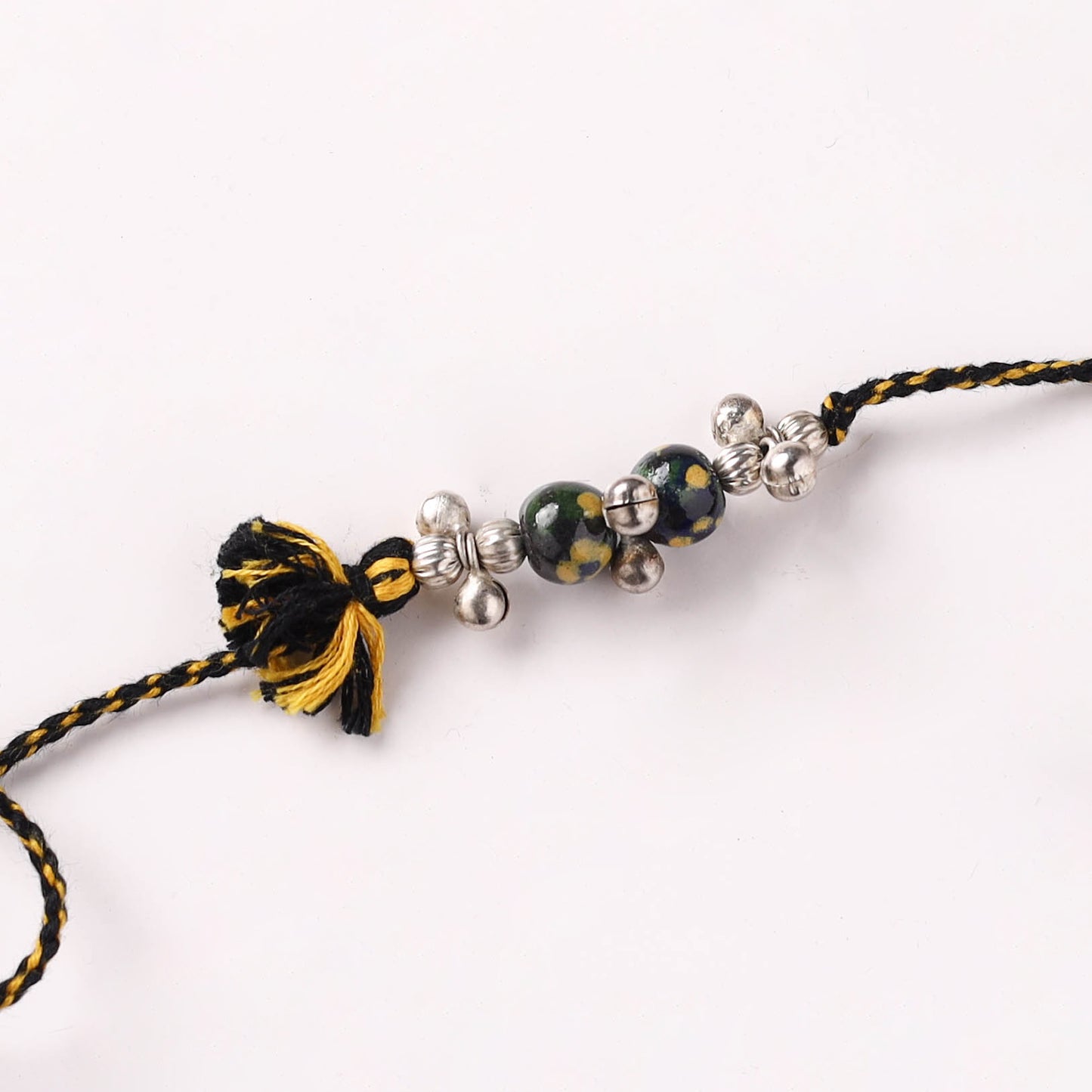 Handcrafted Patwa Threadwork Blue Pottery Beads Rakhi with Potli 02