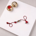 Handcrafted Patwa Threadwork Blue Pottery Beads Rakhi with Potli 03