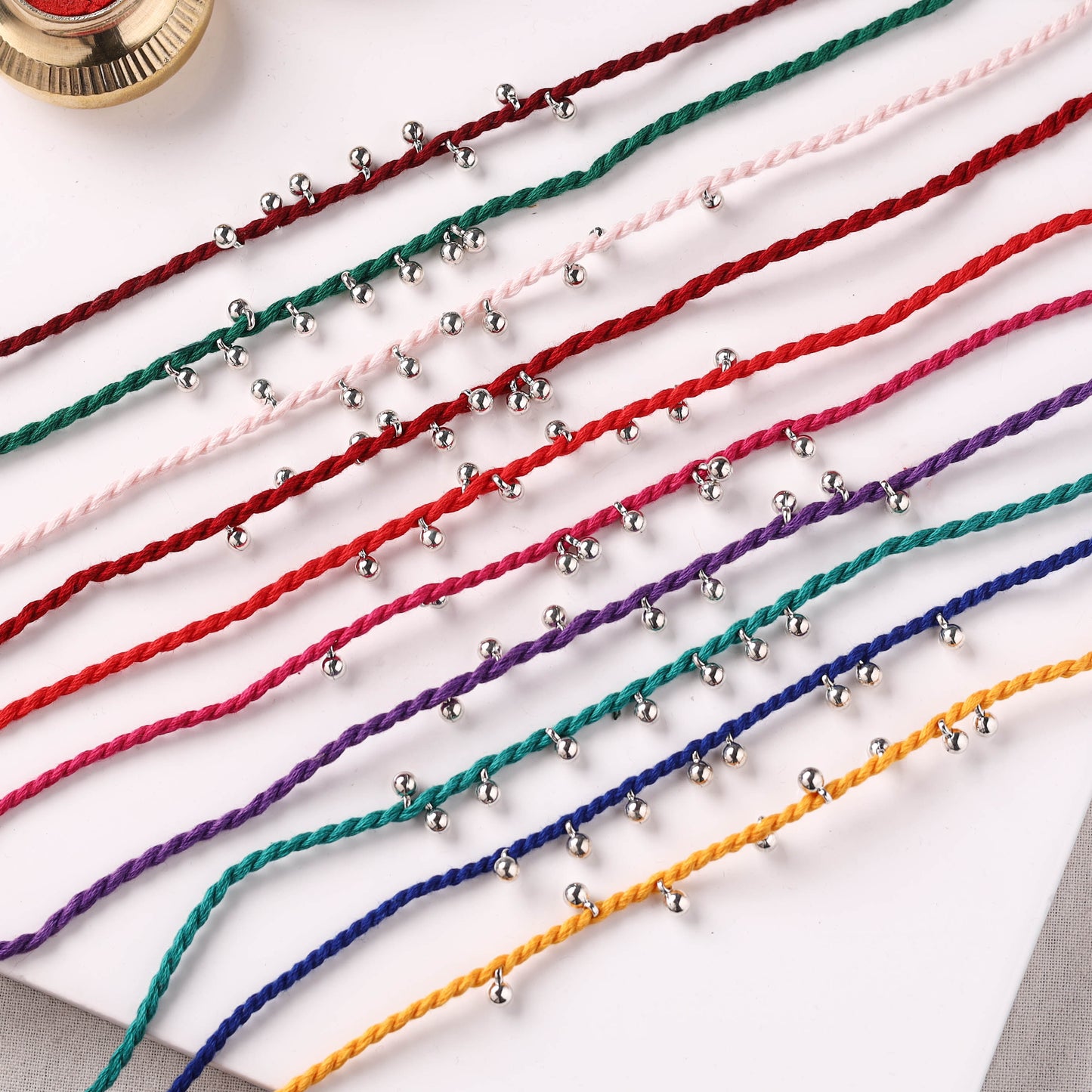 Handmade GS Bead Work Rakhi (Assorted - Set of 10) 09
