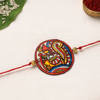 Handpainted Tholu Bommalata Leather Rakhi