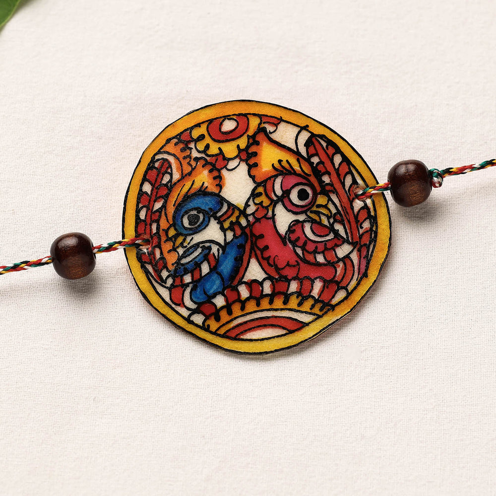 Handpainted Tholu Bommalata Leather Rakhi