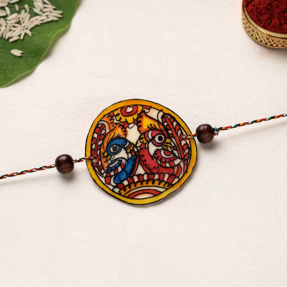 Handpainted Tholu Bommalata Leather Rakhi