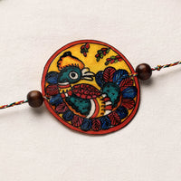 Handpainted Tholu Bommalata Leather Rakhi