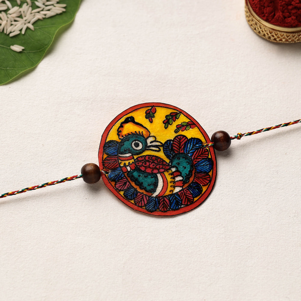 Handpainted Tholu Bommalata Leather Rakhi