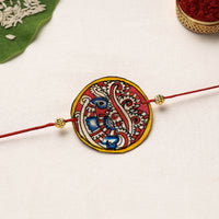 Handpainted Tholu Bommalata Leather Rakhi