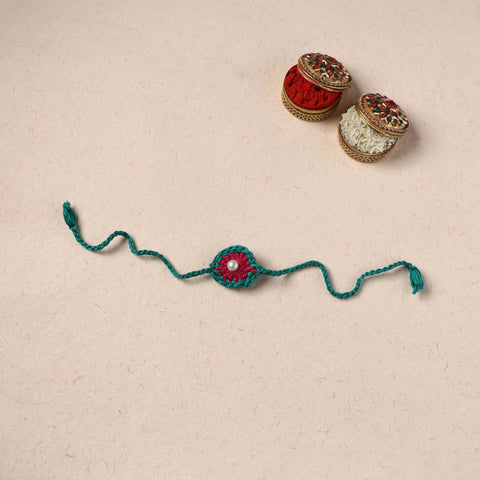 Handmade Crochet Pearl Work Rakhi 02