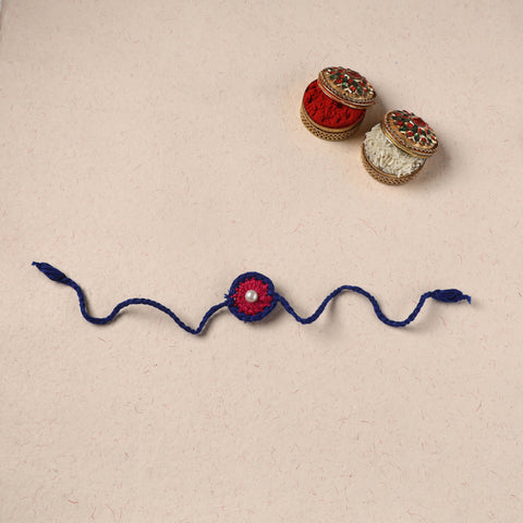Handmade Crochet Pearl Work Rakhi 06