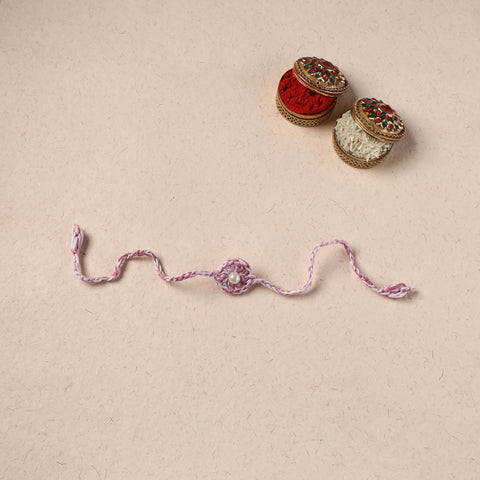 Handmade Crochet Pearl Work Rakhi 09