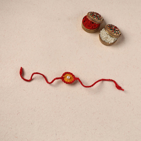 Handmade Crochet Pearl Work Rakhi 11