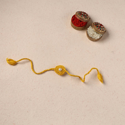 Handmade Crochet Pearl Work Rakhi 12