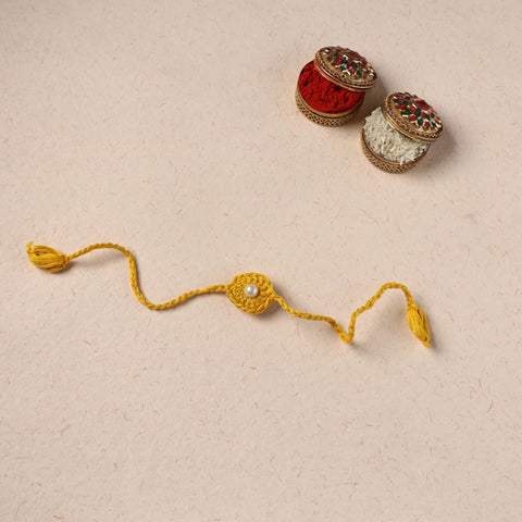 Handmade Crochet Pearl Work Rakhi 12