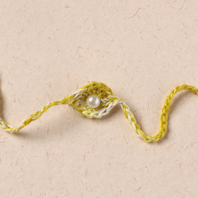 Handmade Crochet Pearl Work Rakhi 20