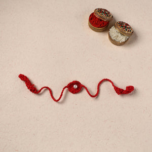 Handmade Crochet Pearl Work Rakhi 23