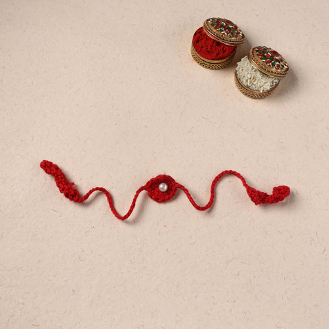 Handmade Crochet Pearl Work Rakhi 23