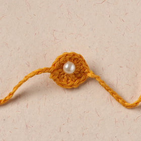 Flower - Handmade Crochet Pearl Work Rakhi 25
