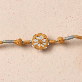Flower - Handmade Patwa Thread & Mirror Work Rakhi 02