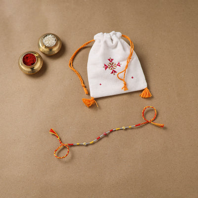 Anant Raksha Thread Work Rakhi with Soof Hand Embroidered Potli 02