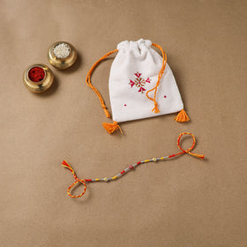 Anant Raksha Thread Work Rakhi with Soof Hand Embroidered Potli 02