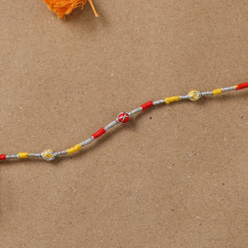 Anant Raksha Thread Work Rakhi with Soof Hand Embroidered Potli 02