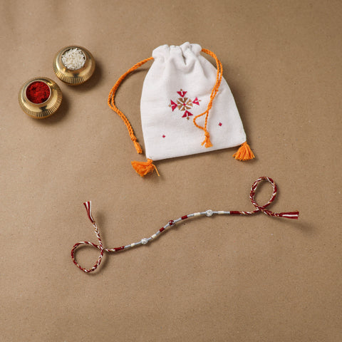 Anant Raksha Thread Work Rakhi with Soof Hand Embroidered Potli 04