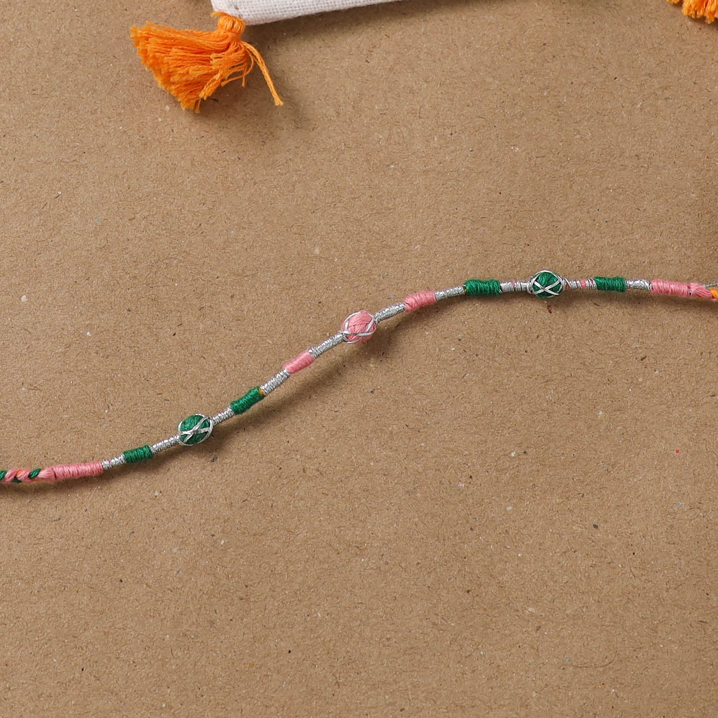 Anant Raksha Thread Work Rakhi with Soof Hand Embroidered Potli 05