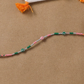 Anant Raksha Thread Work Rakhi with Soof Hand Embroidered Potli 05