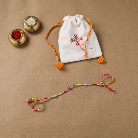 Anant Raksha Thread Work Rakhi with Soof Hand Embroidered Potli 06