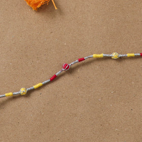 Anant Raksha Thread Work Rakhi with Soof Hand Embroidered Potli 06