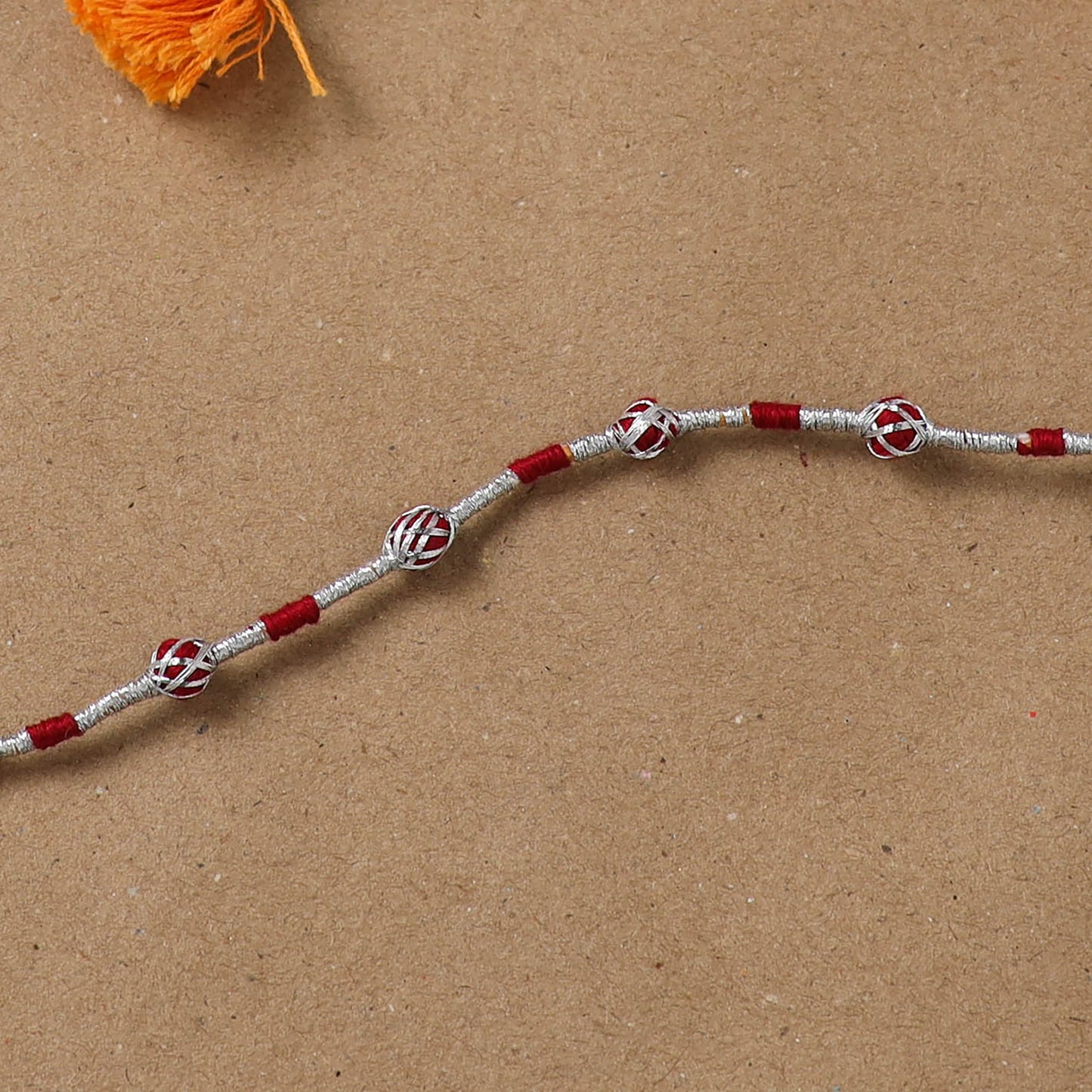 Anant Raksha Thread Work Rakhi with Soof Hand Embroidered Potli 07