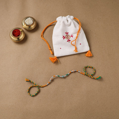Anant Raksha Thread Work Rakhi with Soof Hand Embroidered Potli 09
