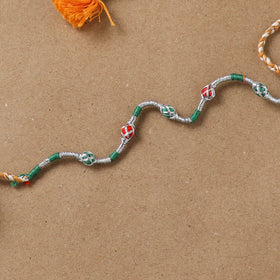 Anant Raksha Thread Work Rakhi with Soof Hand Embroidered Potli 12