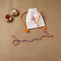Anant Raksha Thread Work Rakhi with Soof Hand Embroidered Potli 14