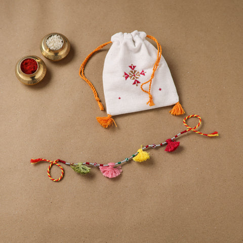Anant Raksha Thread Work Rakhi with Soof Hand Embroidered Potli 15
