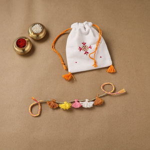Anant Raksha Thread Work Rakhi with Soof Hand Embroidered Potli 16