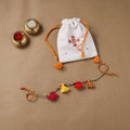 Anant Raksha Thread Work Rakhi with Soof Hand Embroidered Potli 17