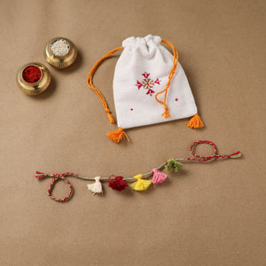 Anant Raksha Thread Work Rakhi with Soof Hand Embroidered Potli 19