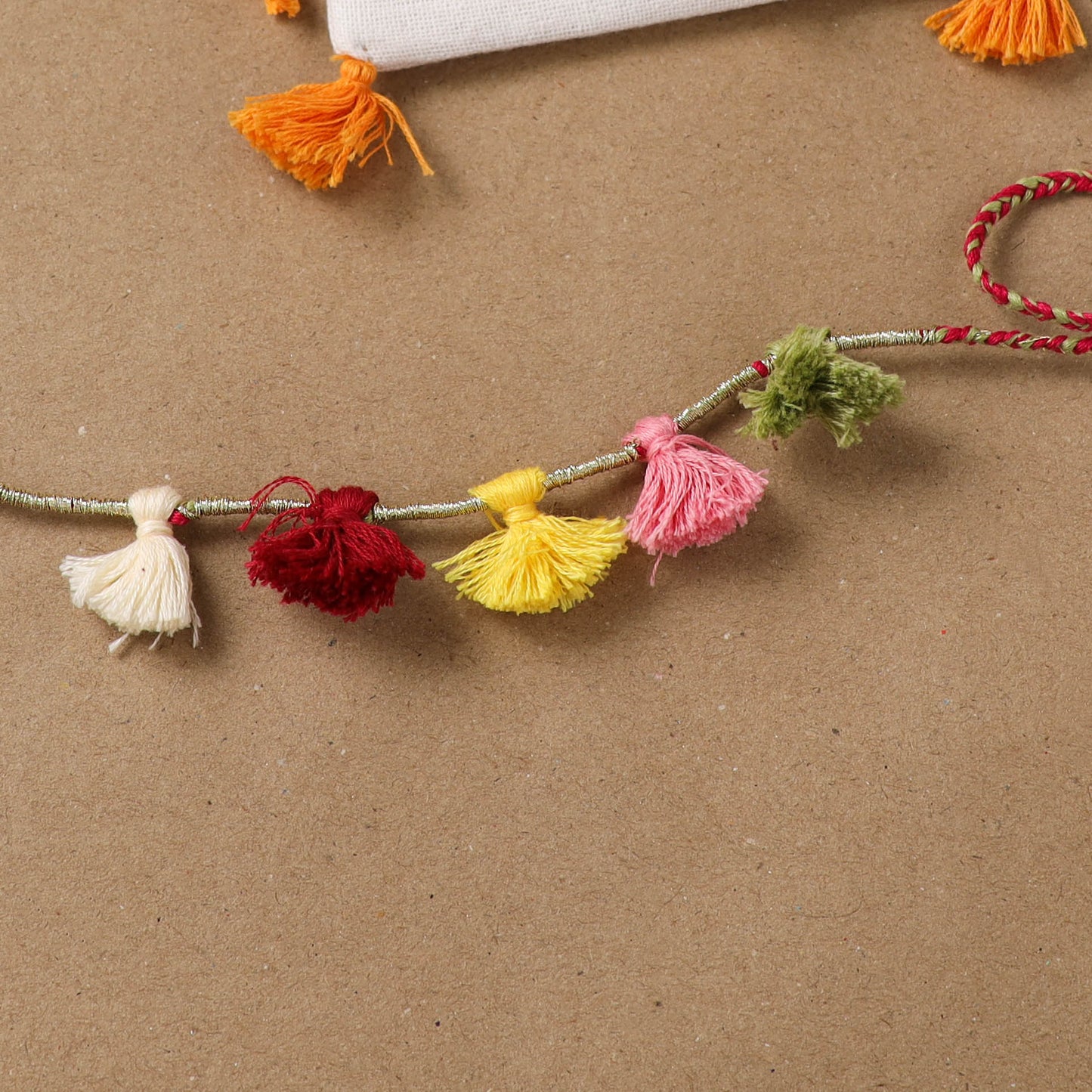 Anant Raksha Thread Work Rakhi with Soof Hand Embroidered Potli 19
