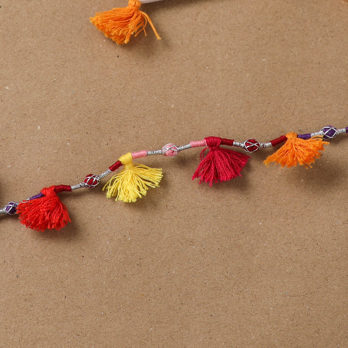 Anant Raksha Thread Work Rakhi with Soof Hand Embroidered Potli 20